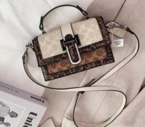 COACH STUDDED SLING BAG ( WHITE & BROWN )